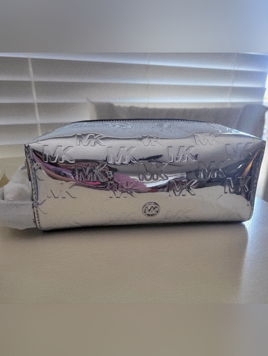 Michael Kors Handbags - Michael Kors Silver Jet Set Cosmetic Pouch